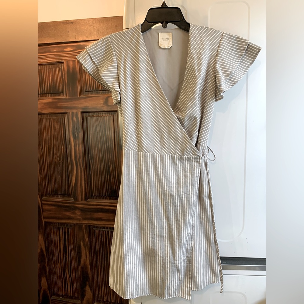 NWOT- Women’s wrap dress with flutter sleeve.